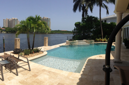swimming pool by the intracoastal in South Florida with buildings in the background